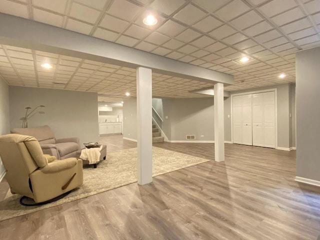 1920 Waverly Cir, Saint Charles, IL 60174 - finished basement featuring wood finished floors, stairway, and recessed lighting