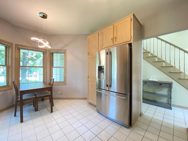 1920 Waverly Cir, Saint Charles, IL 60174 - kitchen with stainless steel fridge with ice dispenser, light brown cabinets, light tile patterned floors, a chandelier, and decorative light fixtures
