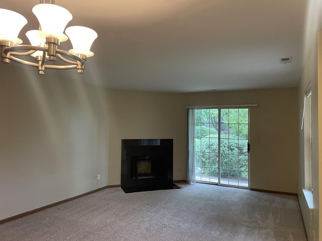 124 White Oak Ct Unit 2, Schaumburg, IL 60195 - unfurnished living room with carpet flooring, a chandelier, and a fireplace with flush hearth