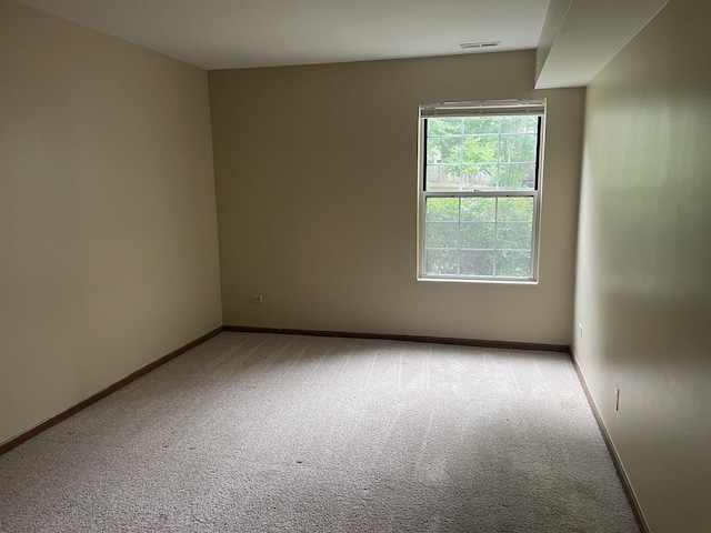 124 White Oak Ct Unit 2, Schaumburg, IL 60195 - carpeted empty room featuring baseboards