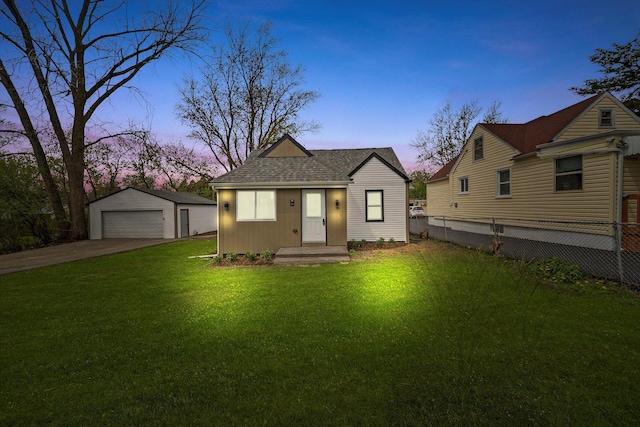 1326 N Poplar Ave, Round Lake Beach, IL 60073 - bungalow with a detached garage, an outbuilding, and roof with shingles