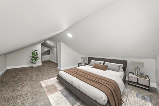 1326 N Poplar Ave, Round Lake Beach, IL 60073 - bedroom featuring vaulted ceiling and carpet flooring