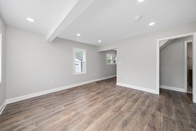 1326 N Poplar Ave, Round Lake Beach, IL 60073 - empty room with wood finished floors, a smoke detector, recessed lighting, and beamed ceiling