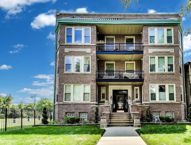 6415 S Kimbark Ave Unit 3, Chicago, IL 60637 - view of front of property with brick siding and a balcony