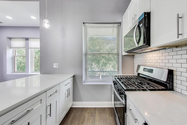 6415 S Kimbark Ave Unit 3, Chicago, IL 60637 - kitchen featuring appliances with stainless steel finishes, tasteful backsplash, light countertops, healthy amount of natural light, and recessed lighting