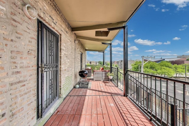 6415 S Kimbark Ave Unit 3, Chicago, IL 60637 - wooden terrace with a grill