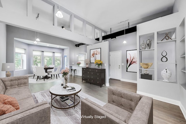 6415 S Kimbark Ave Unit 3, Chicago, IL 60637 - living area featuring wood finished floors, a high ceiling, and built in features