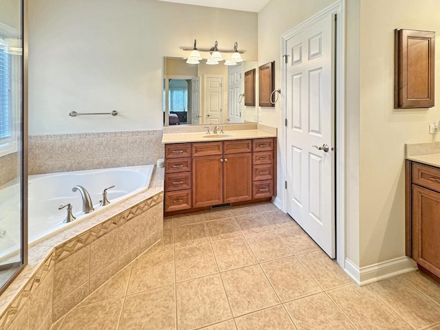 807 Wedgewood Ct, Lindenhurst, IL 60046 - bathroom featuring vanity, a garden tub, and tile patterned flooring