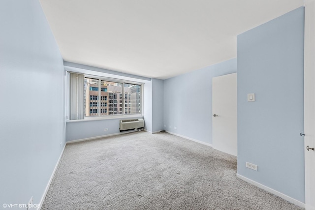 211 E Ohio St Unit 1825, Chicago, IL 60611 - carpeted empty room with a wall mounted AC and baseboards