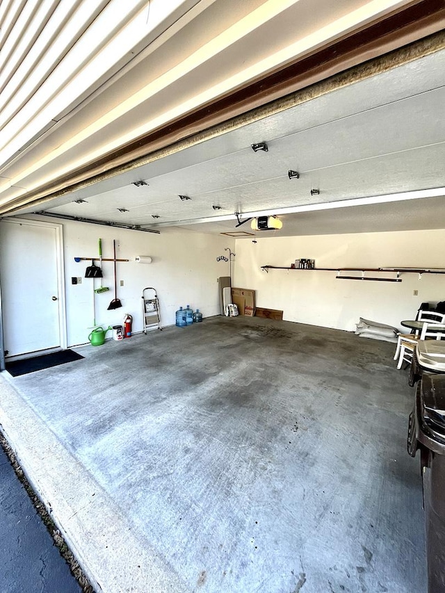 500 Jenkran Way Unit 2, Morrison, IL 61270 - garage featuring a garage door opener