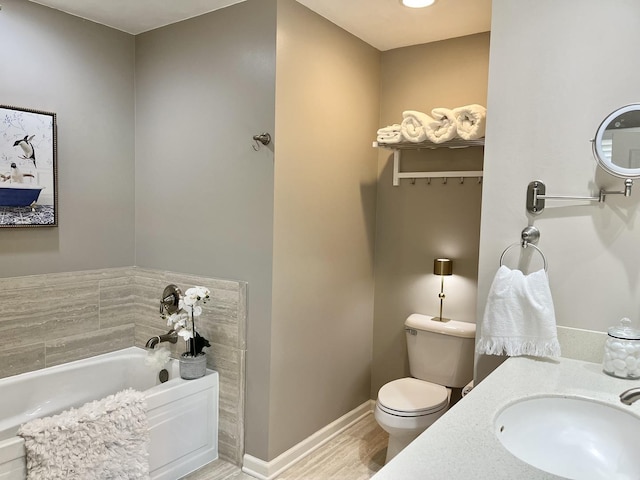 441 Highland Ave, Crystal Lake, IL 60014 - full bathroom featuring a garden tub, wood finished floors, and vanity