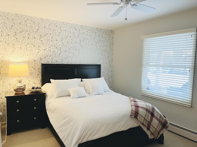 441 Highland Ave, Crystal Lake, IL 60014 - bedroom with wallpapered walls, a baseboard heating unit, ceiling fan, and carpet