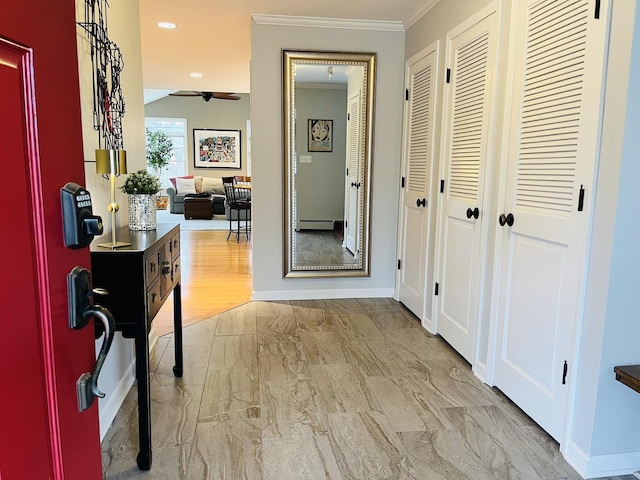 441 Highland Ave, Crystal Lake, IL 60014 - hall featuring light marble finish flooring, ornamental molding, and baseboard heating
