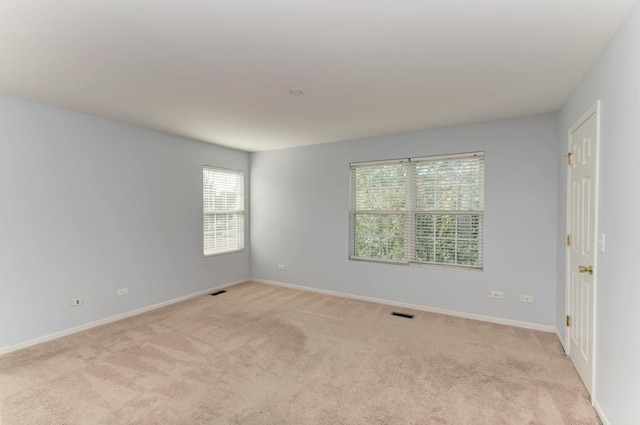 24341 Leski Ln, Plainfield, IL 60585 - spare room featuring light carpet and baseboards