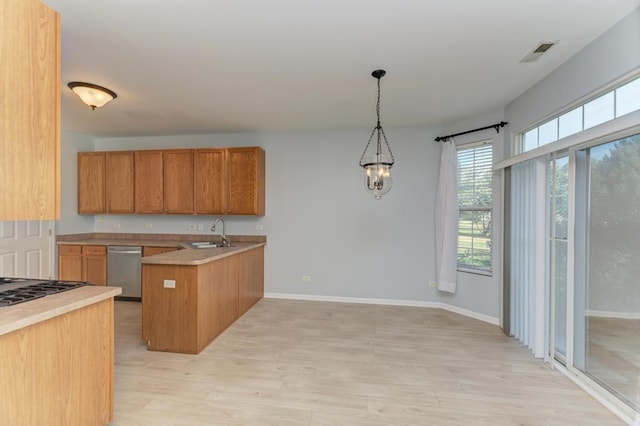 24341 Leski Ln, Plainfield, IL 60585 - kitchen featuring stainless steel dishwasher, a peninsula, brown cabinetry, light wood-style floors, and pendant lighting
