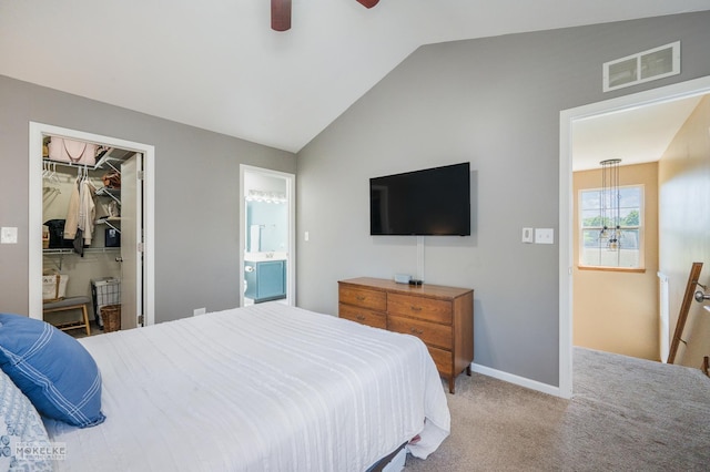 2326 Woodhill Ct, Plainfield, IL 60586 - bedroom featuring lofted ceiling, carpet, a spacious closet, connected bathroom, and a ceiling fan