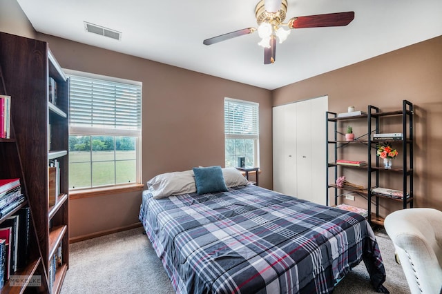 2326 Woodhill Ct, Plainfield, IL 60586 - bedroom with carpet flooring, a closet, and a ceiling fan
