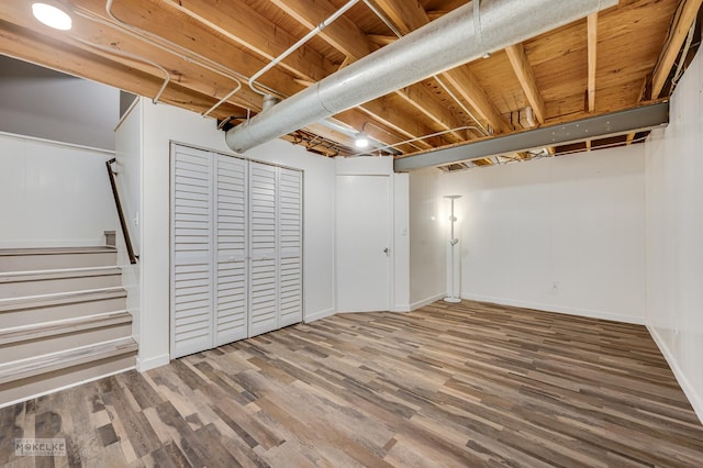 2326 Woodhill Ct, Plainfield, IL 60586 - finished basement featuring wood finished floors and stairs