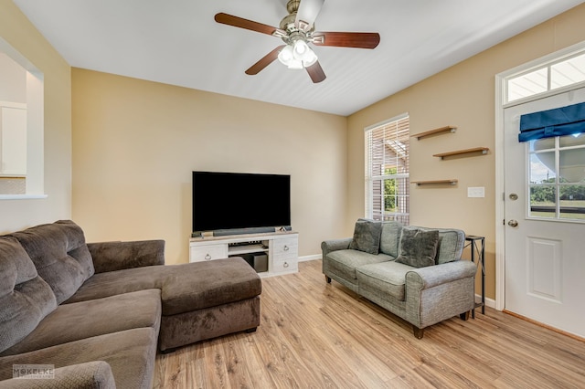 2326 Woodhill Ct, Plainfield, IL 60586 - living area featuring light wood-type flooring, ceiling fan, and plenty of natural light