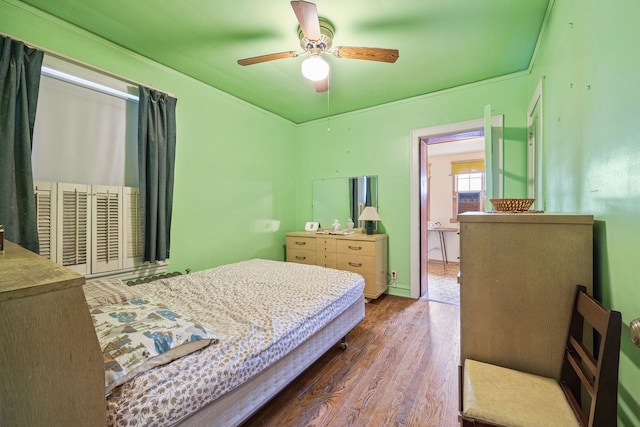 2955 N Lotus Ave, Chicago, IL 60641 - bedroom with wood finished floors and a ceiling fan