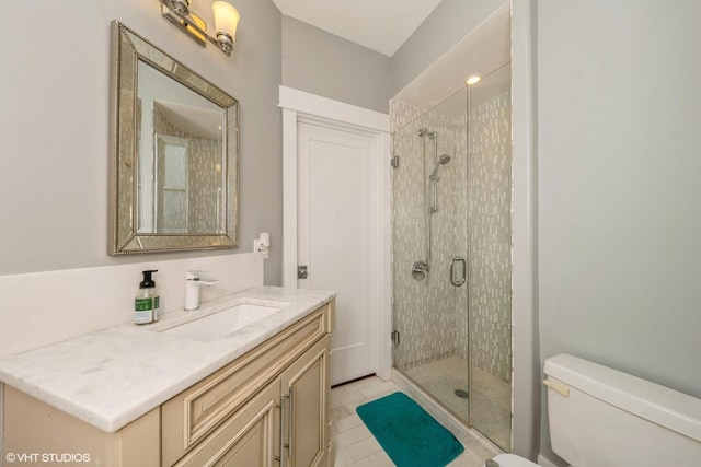 4456 S Berkeley Ave, Chicago, IL 60653 - bathroom with a shower stall, vanity, and tile patterned flooring