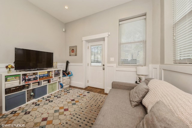 4456 S Berkeley Ave, Chicago, IL 60653 - living room featuring a wainscoted wall and wood finished floors