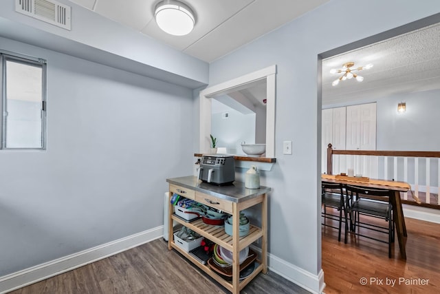 61 W Pier Dr Unit 201, Westmont, IL 60559 - corridor featuring wood finished floors and baseboards