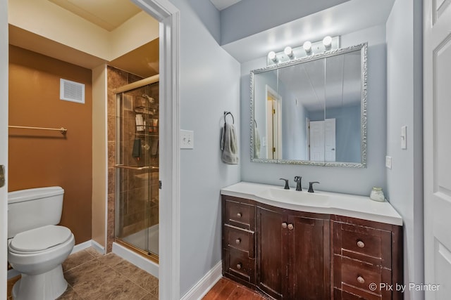 61 W Pier Dr Unit 201, Westmont, IL 60559 - bathroom featuring a stall shower, vanity, and tile patterned flooring