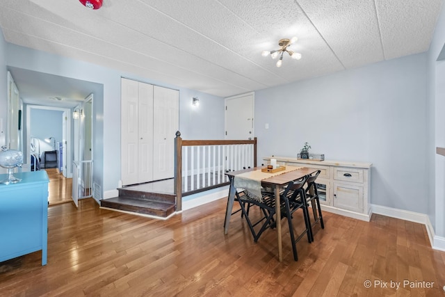 61 W Pier Dr Unit 201, Westmont, IL 60559 - dining area with wood finished floors and baseboards