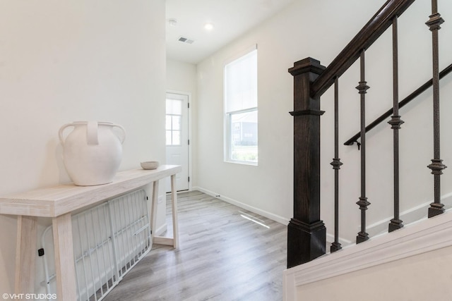 24518 W Alexis Ln, Plainfield, IL 60585 - corridor with light wood finished floors, stairway, and recessed lighting