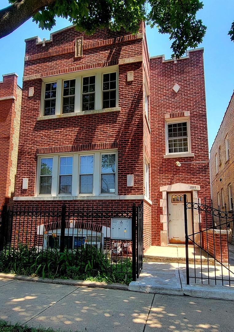 6013 S Troy St, Chicago, IL 60629 - view of front facade featuring brick siding