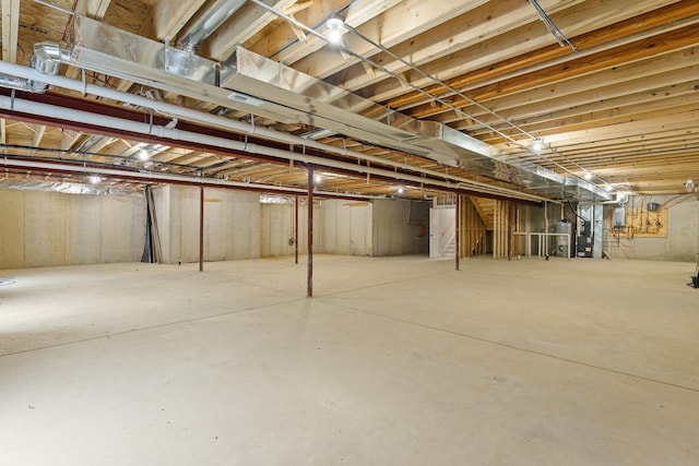 25216 S Channault Ave, Monee, IL 60449 - unfinished below grade area featuring gas water heater and electric panel