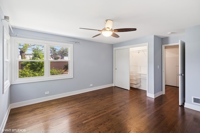 2543 Crawford Ave, Evanston, IL 60201 - unfurnished bedroom featuring dark wood-type flooring, a closet, and a ceiling fan