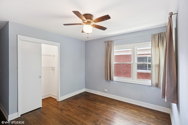 2543 Crawford Ave, Evanston, IL 60201 - unfurnished bedroom with dark wood-type flooring and ceiling fan