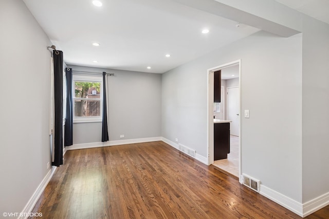 2543 Crawford Ave, Evanston, IL 60201 - spare room featuring wood finished floors and recessed lighting