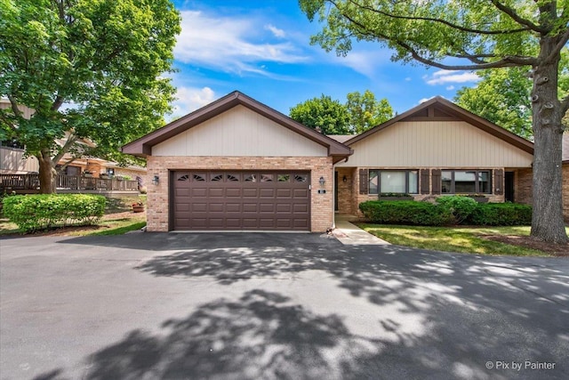 81 Castle Rock Ln, Bloomingdale, IL 60108 - single story home with brick siding, driveway, and an attached garage