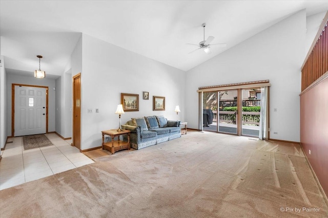 81 Castle Rock Ln, Bloomingdale, IL 60108 - living room with ceiling fan, high vaulted ceiling, light carpet, and light tile patterned floors
