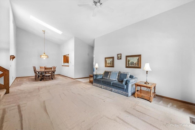 81 Castle Rock Ln, Bloomingdale, IL 60108 - living area with high vaulted ceiling, carpet flooring, and a ceiling fan