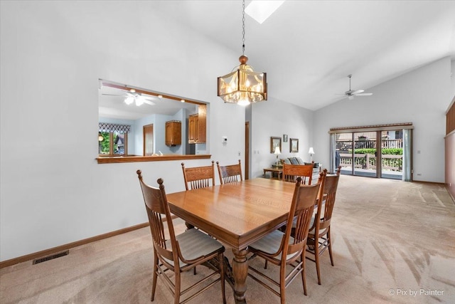 81 Castle Rock Ln, Bloomingdale, IL 60108 - dining room with light carpet, a ceiling fan, high vaulted ceiling, and healthy amount of natural light