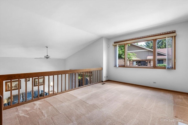 81 Castle Rock Ln, Bloomingdale, IL 60108 - empty room with carpet, lofted ceiling, and a ceiling fan