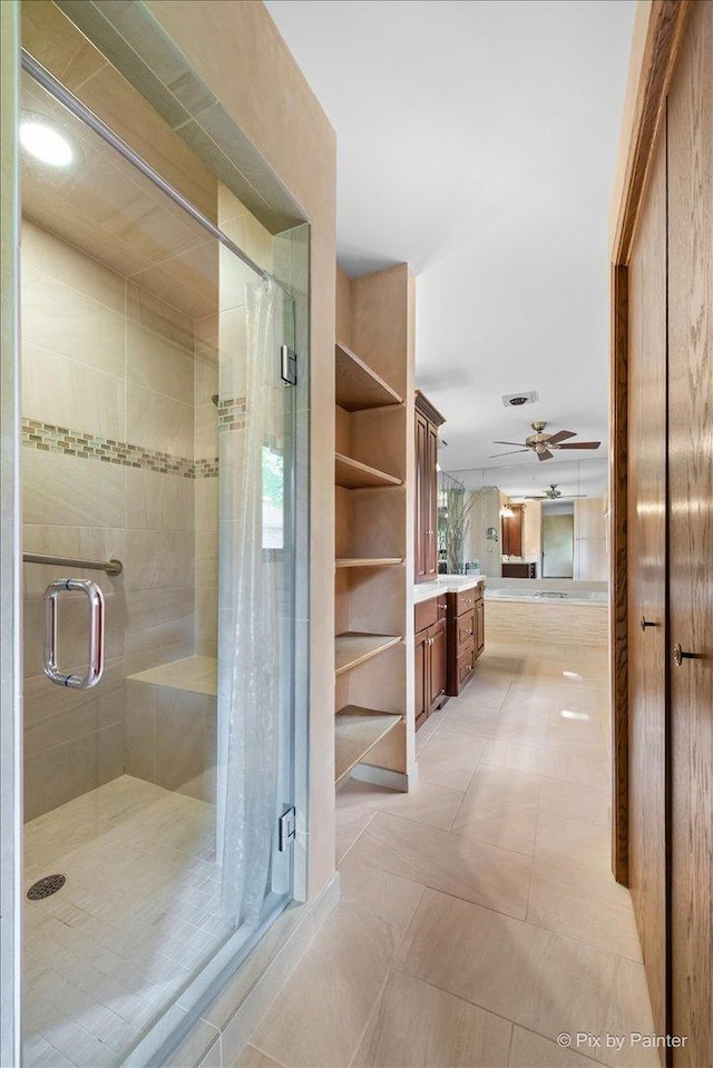 81 Castle Rock Ln, Bloomingdale, IL 60108 - bathroom with vanity, a shower stall, and ceiling fan