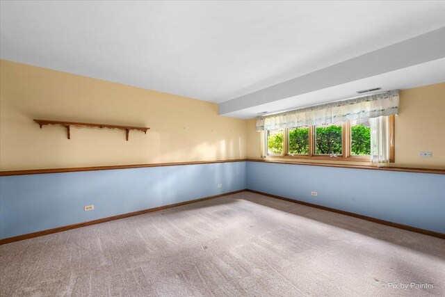 81 Castle Rock Ln, Bloomingdale, IL 60108 - carpeted empty room with baseboards