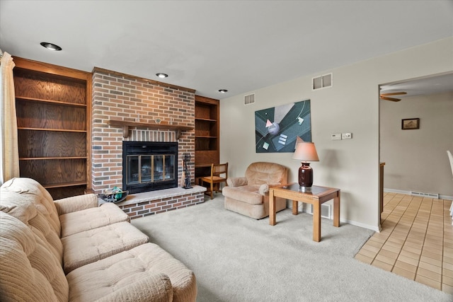 9160 S 88th Ct, Hickory Hills, IL 60457 - living room with carpet, built in shelves, tile patterned flooring, and a brick fireplace