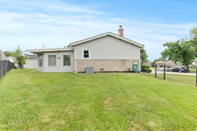 9160 S 88th Ct, Hickory Hills, IL 60457 - back of house featuring brick siding and a chimney