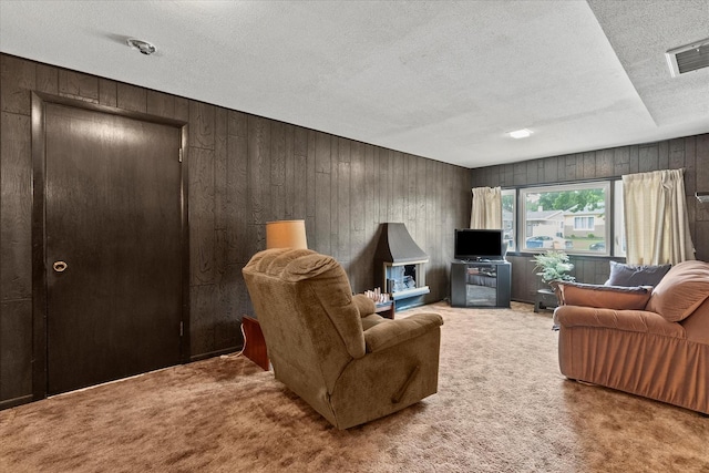 9160 S 88th Ct, Hickory Hills, IL 60457 - carpeted living room featuring a textured ceiling and wood walls