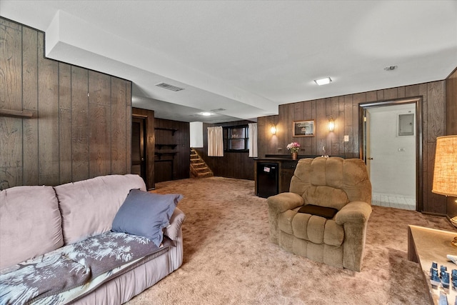9160 S 88th Ct, Hickory Hills, IL 60457 - living area with wooden walls, light carpet, electric panel, stairs, and bar
