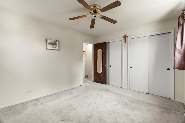 9160 S 88th Ct, Hickory Hills, IL 60457 - unfurnished bedroom with multiple closets, carpet, and ceiling fan