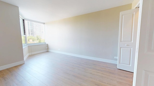 720 W Gordon Ter Unit 6J, Chicago, IL 60613 - empty room with light wood-type flooring