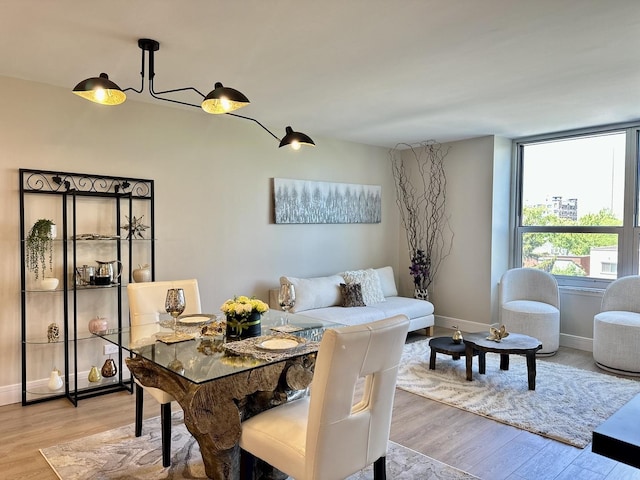 720 W Gordon Ter Unit 6J, Chicago, IL 60613 - dining space featuring light wood-style flooring
