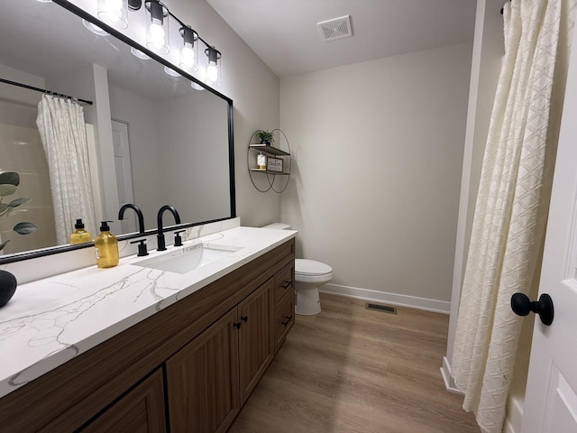 339 Terra Springs Cir Unit 339, Volo, IL 60020 - bathroom with vanity, wood finished floors, and a shower with shower curtain
